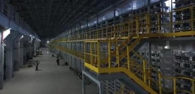 A sprawling mining farm with rows of efficient mining rigs powered by sustainable energy